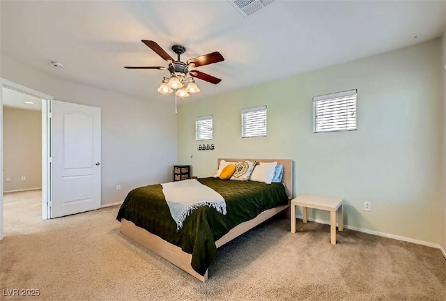 bedroom with light colored carpet and ceiling fan