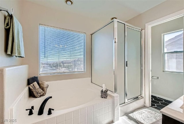 bathroom featuring vanity and plus walk in shower