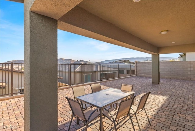 view of patio / terrace with outdoor dining area and a fenced backyard