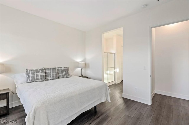 bedroom featuring wood finished floors and baseboards