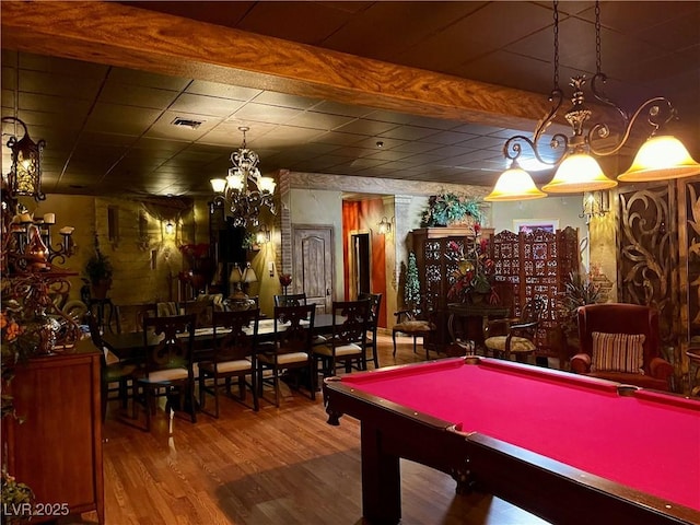 game room featuring wood finished floors and visible vents