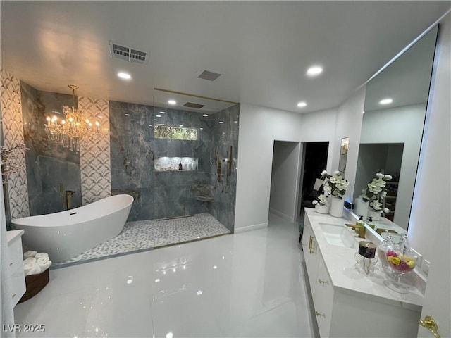 bathroom featuring a soaking tub, visible vents, vanity, and a walk in shower