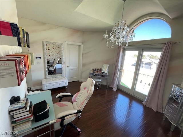 home office featuring a chandelier and wood finished floors