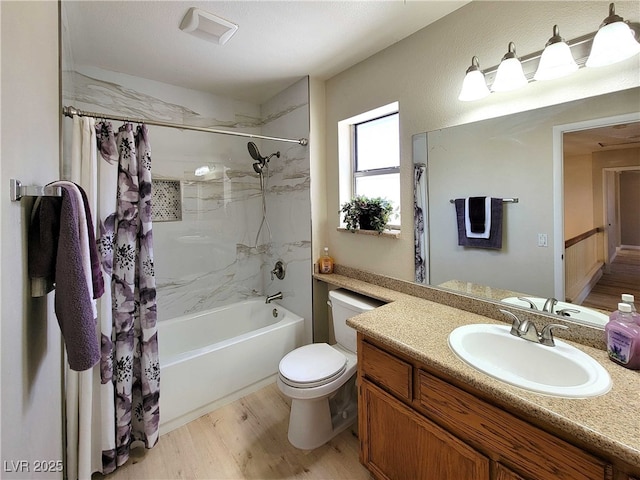 full bathroom with hardwood / wood-style flooring, vanity, toilet, and shower / bath combo with shower curtain