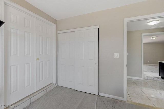 unfurnished bedroom with a closet