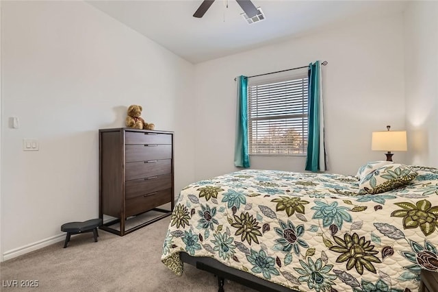 carpeted bedroom featuring lofted ceiling and ceiling fan