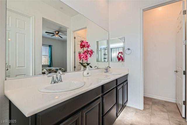 bathroom featuring vanity and ceiling fan