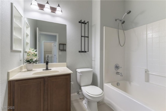 full bathroom featuring tile patterned floors, vanity, toilet, and bathing tub / shower combination