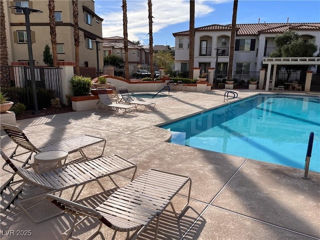 view of pool with a patio area