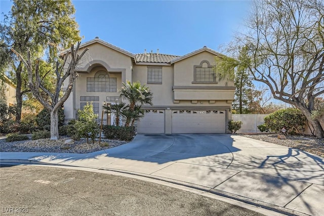 view of front of property with a garage