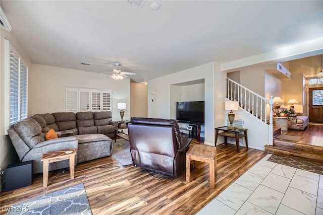 living room with ceiling fan