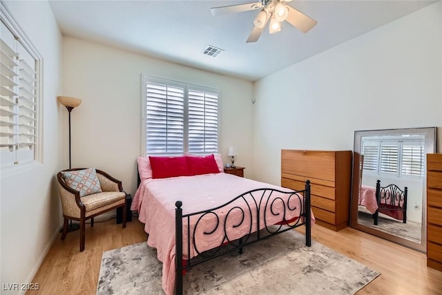 bedroom featuring hardwood / wood-style flooring and ceiling fan