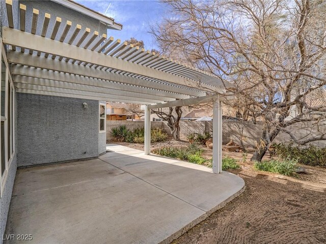 view of patio / terrace featuring a pergola