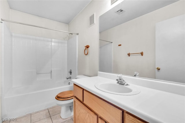 full bathroom featuring vanity, bathtub / shower combination, tile patterned floors, and toilet