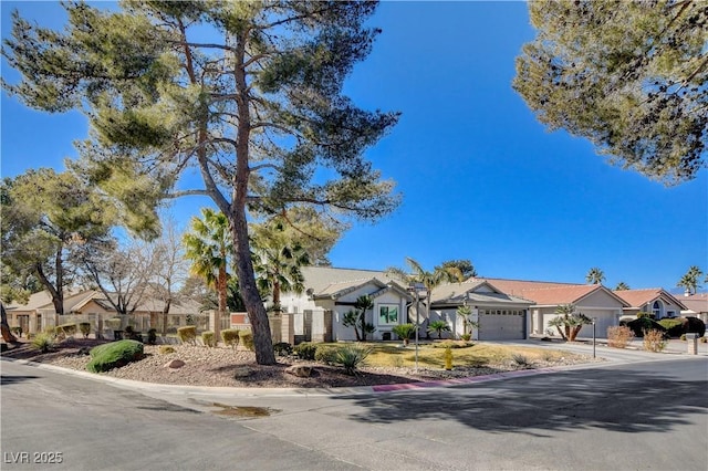 ranch-style home featuring a garage