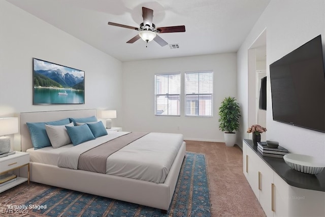 carpeted bedroom featuring ceiling fan