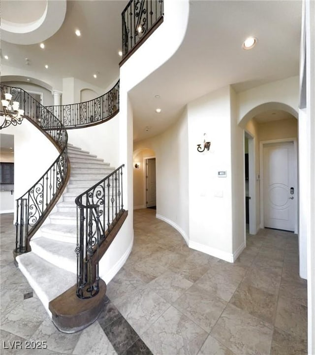 stairs with a towering ceiling