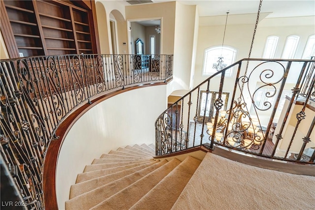 stairs with a towering ceiling