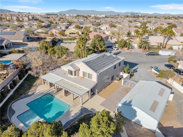 9435 Westwind Rd, Las Vegas, NV 89139 - aerial view of residential area with mountains and a pool area