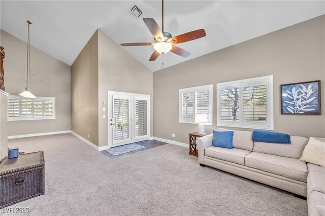 9435 Westwind Rd, Las Vegas, NV 89139 - living area featuring high vaulted ceiling, a ceiling fan, carpet, and baseboards