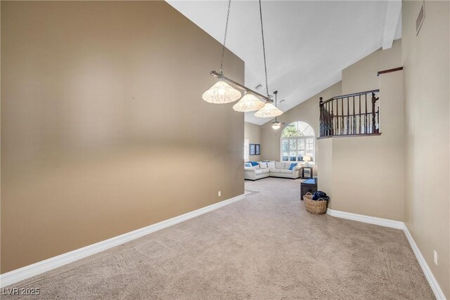 9435 Westwind Rd, Las Vegas, NV 89139 - unfurnished dining area featuring high vaulted ceiling, carpet flooring, and baseboards