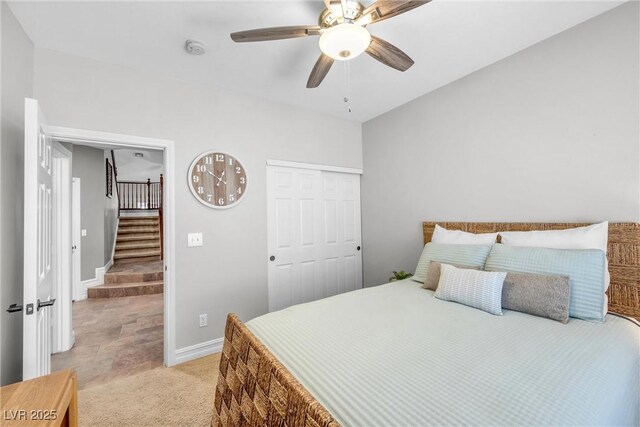 9435 Westwind Rd, Las Vegas, NV 89139 - bedroom featuring light colored carpet, a closet, baseboards, and ceiling fan