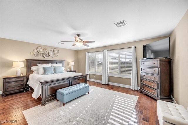 9435 Westwind Rd, Las Vegas, NV 89139 - bedroom featuring baseboards, wood finished floors, and ceiling fan