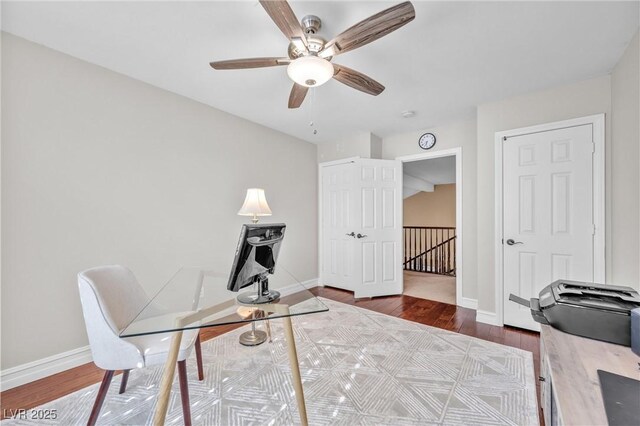 9435 Westwind Rd, Las Vegas, NV 89139 - office space with baseboards, dark wood-style floors, and a ceiling fan