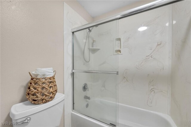 9435 Westwind Rd, Las Vegas, NV 89139 - bathroom with combined bath / shower with glass door and toilet