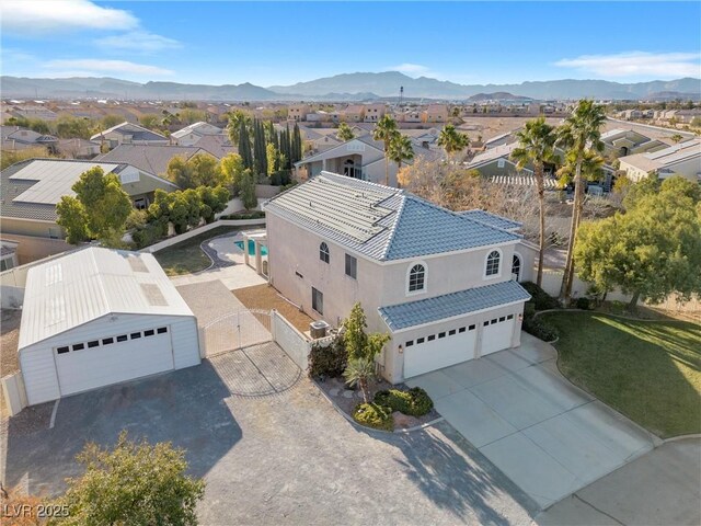 9435 Westwind Rd, Las Vegas, NV 89139 - aerial view of residential area with a mountain backdrop