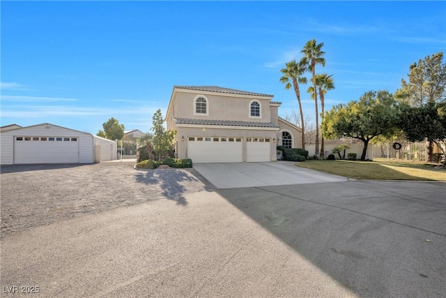 9435 Westwind Rd, Las Vegas, NV 89139 - traditional-style home with fence, stucco siding, a tile roof, and driveway