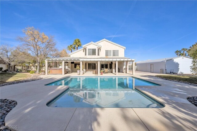 9435 Westwind Rd, Las Vegas, NV 89139 - outdoor pool with a hot tub and a patio area