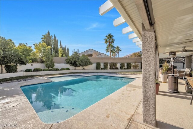 9435 Westwind Rd, Las Vegas, NV 89139 - view of swimming pool featuring a patio area and a fenced backyard