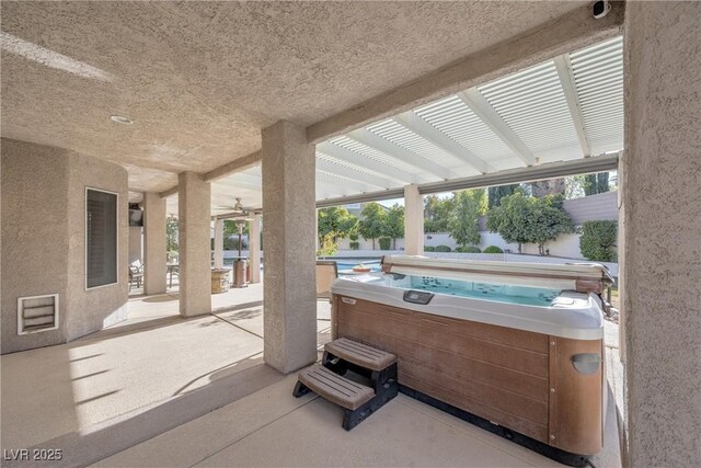 9435 Westwind Rd, Las Vegas, NV 89139 - view of patio / terrace with a hot tub