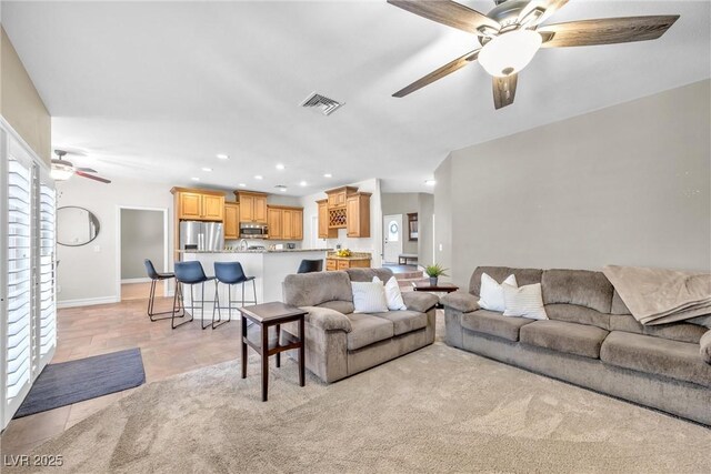 9435 Westwind Rd, Las Vegas, NV 89139 - living room featuring ceiling fan, recessed lighting, and baseboards