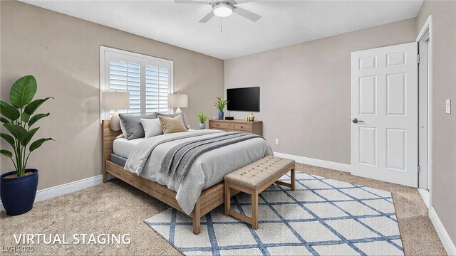 9435 Westwind Rd, Las Vegas, NV 89139 - bedroom featuring light colored carpet, baseboards, and ceiling fan