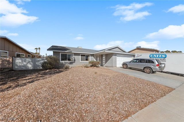 single story home featuring a garage