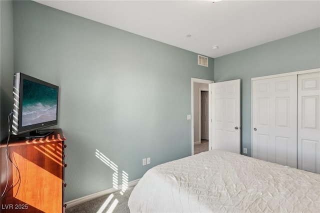 bedroom featuring a closet and carpet