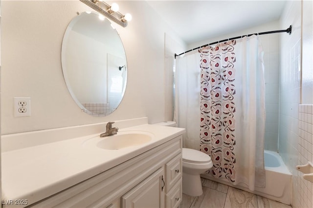 full bathroom featuring vanity, toilet, and shower / bath combo with shower curtain