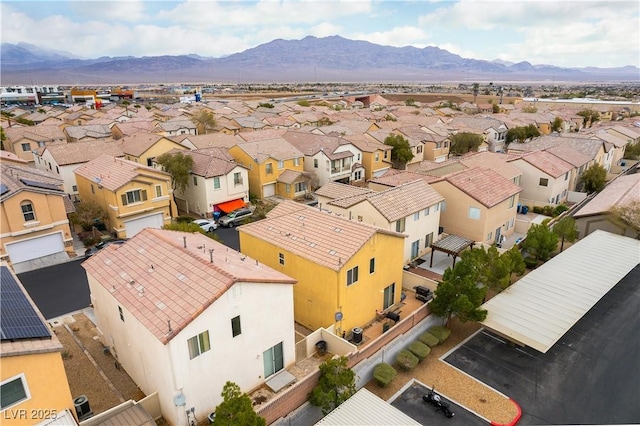 birds eye view of property featuring a residential view and a mountain view