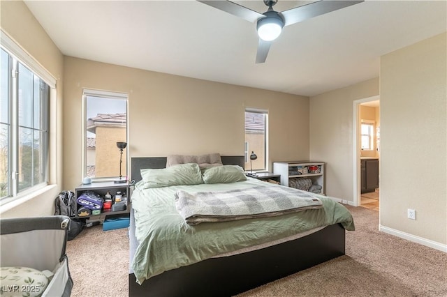 bedroom with carpet floors, ceiling fan, and baseboards