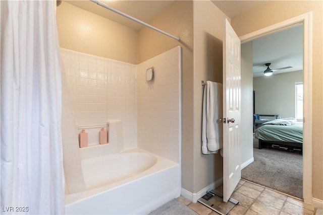 ensuite bathroom with a ceiling fan, connected bathroom, baseboards, and shower / bath combination with curtain