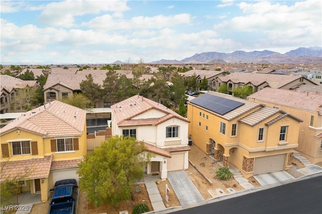 birds eye view of property featuring a residential view and a mountain view