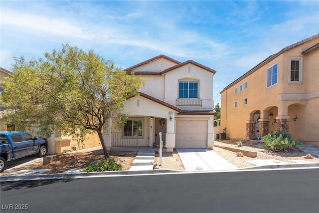 9527 Havasu Canyon Ave, Las Vegas, NV 89166 - mediterranean / spanish house featuring an attached garage, concrete driveway, central AC unit, and stucco siding