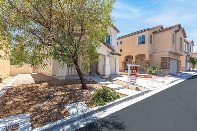 9527 Havasu Canyon Ave, Las Vegas, NV 89166 - view of front of home with a garage and stucco siding