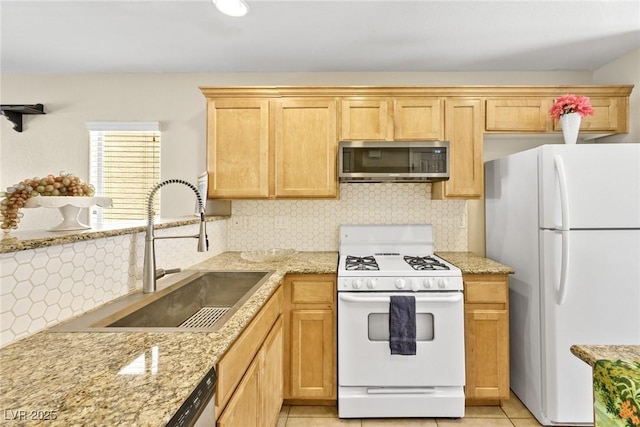 9527 Havasu Canyon Ave, Las Vegas, NV 89166 - kitchen featuring white appliances, a sink, light brown cabinetry, and decorative backsplash