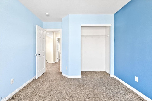 9527 Havasu Canyon Ave, Las Vegas, NV 89166 - unfurnished bedroom featuring carpet floors, a closet, and baseboards