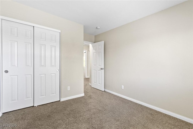 9527 Havasu Canyon Ave, Las Vegas, NV 89166 - unfurnished bedroom featuring carpet flooring, baseboards, and a closet