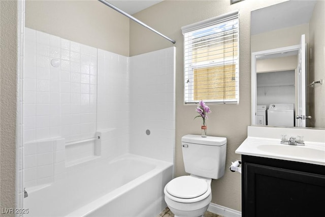9527 Havasu Canyon Ave, Las Vegas, NV 89166 - full bathroom with washing machine and clothes dryer, toilet, vanity, shower / bath combination, and a textured wall