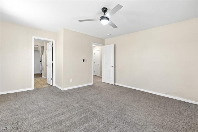 9527 Havasu Canyon Ave, Las Vegas, NV 89166 - unfurnished bedroom with carpet, baseboards, and a ceiling fan